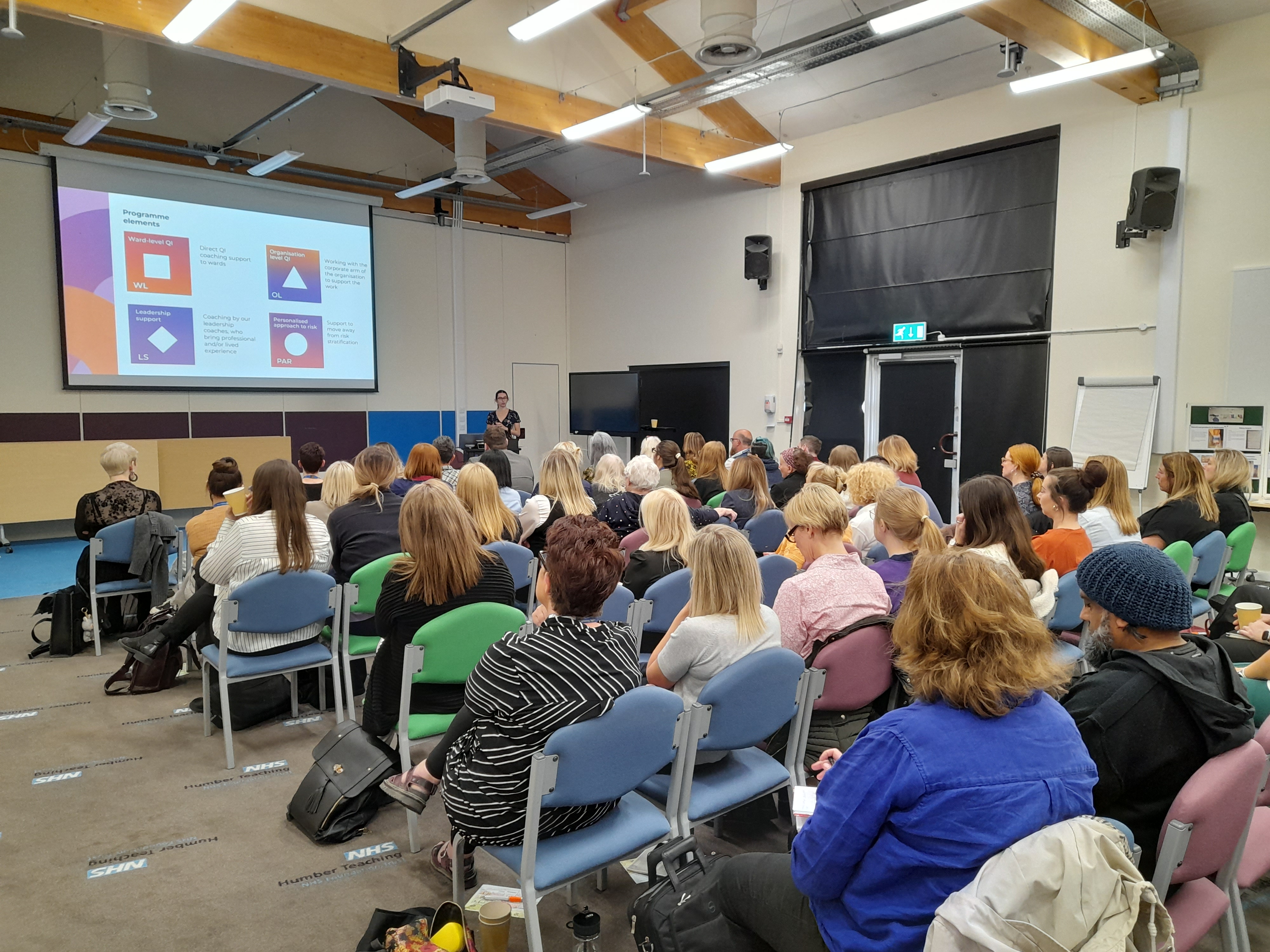Audience watching presentation