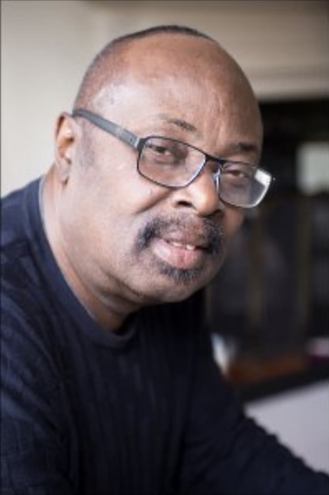 Dr Charles Aryiku